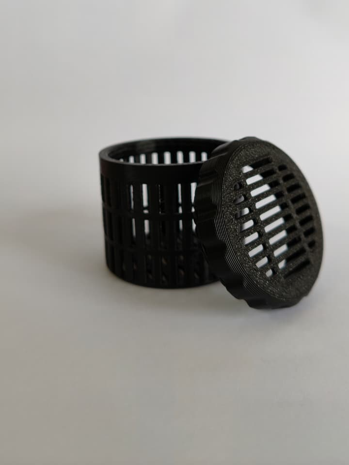 Two-part vented container 3D printed in PLA, produced as a batch of eighty